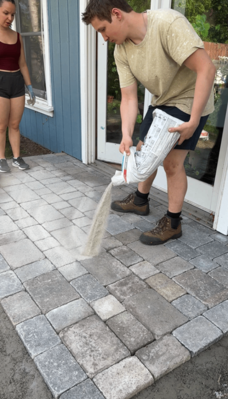 Pouring polymeric sand