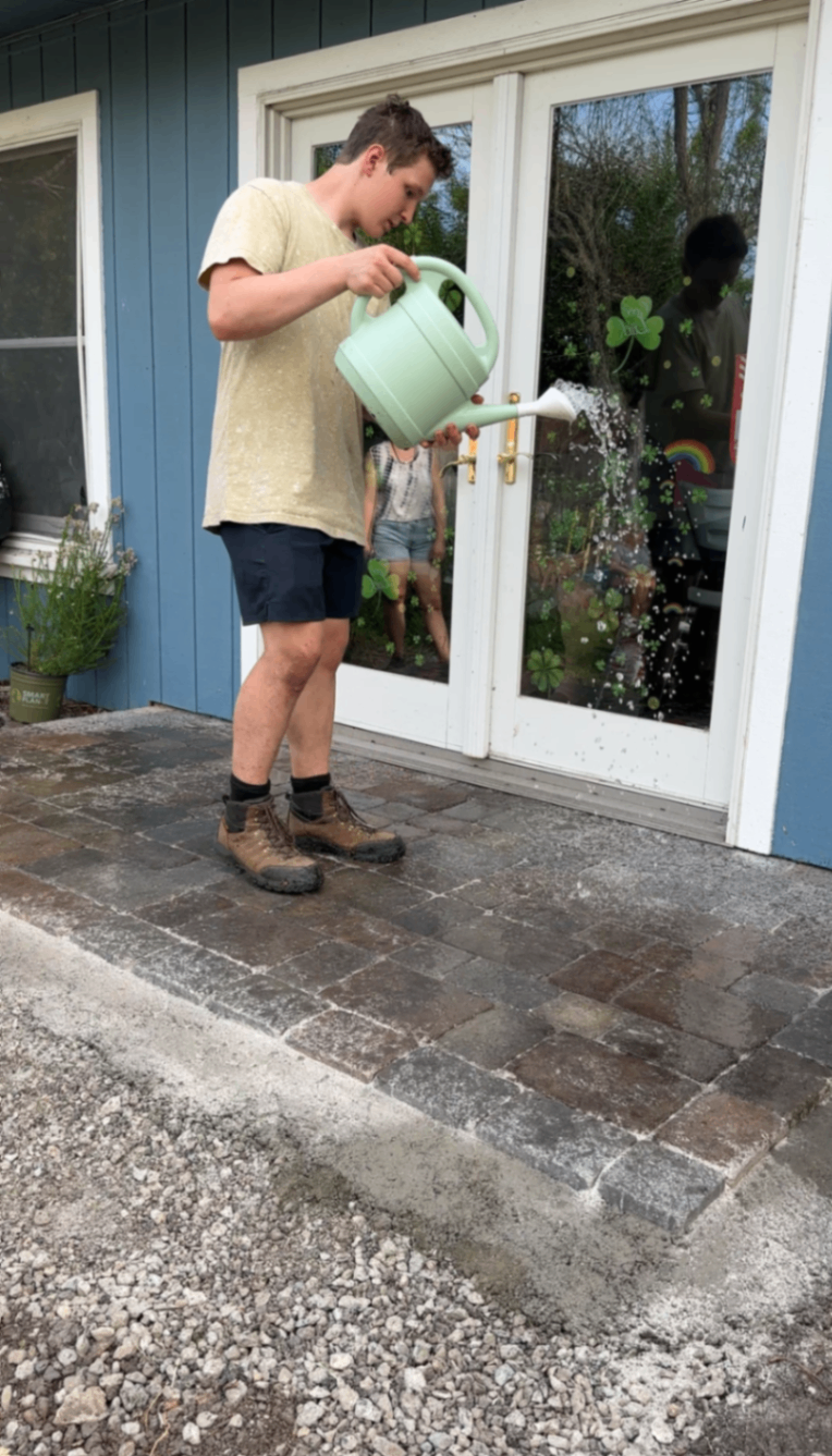Pouring water on polymeric sand